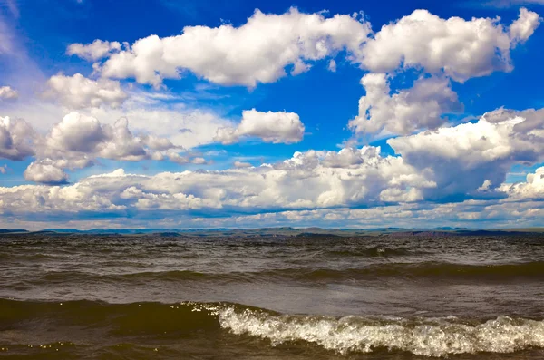 stock image Cloudy blue sky over the sea