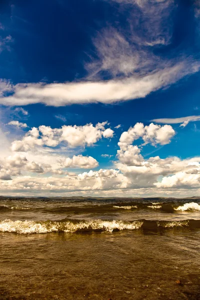 stock image Cloudy blue sky over the sea