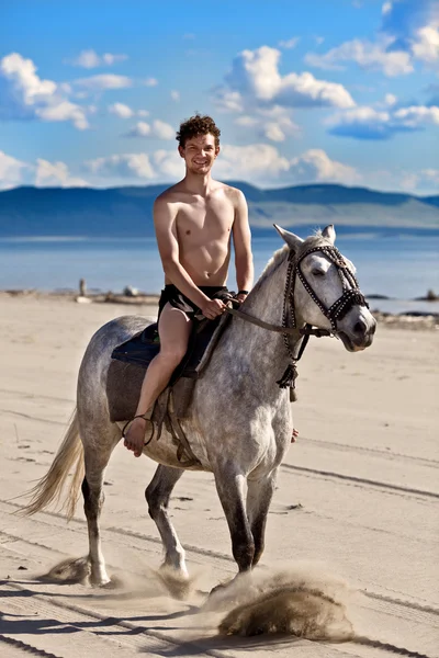 Horseman on the beach — Stock Photo, Image