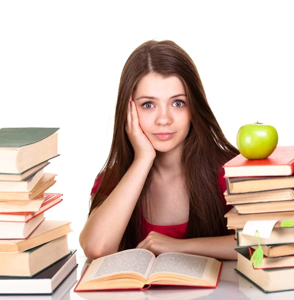 Tiener meisje met veel van boeken, geïsoleerd op wit — Stockfoto