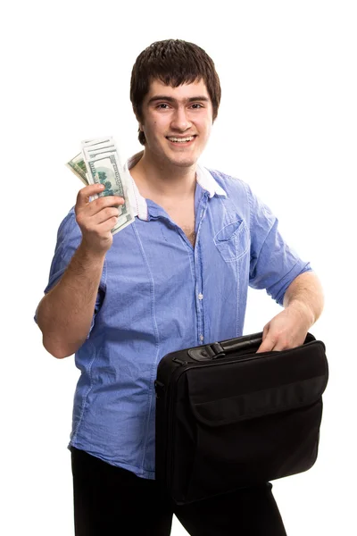 Young handsome man with case holding dollars — Stock Photo, Image
