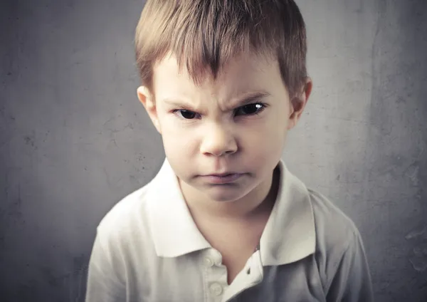 Angry child Stock Image