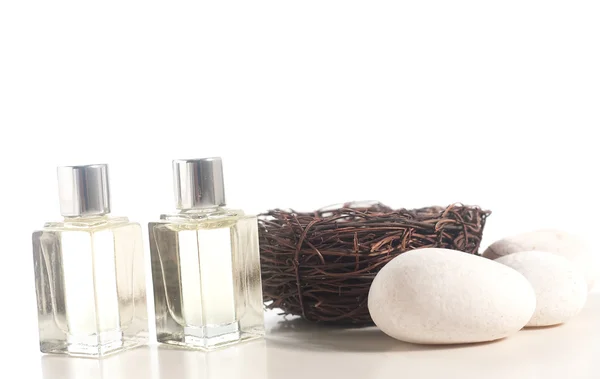 Perfume bottle with the bird nest — Stock Photo, Image