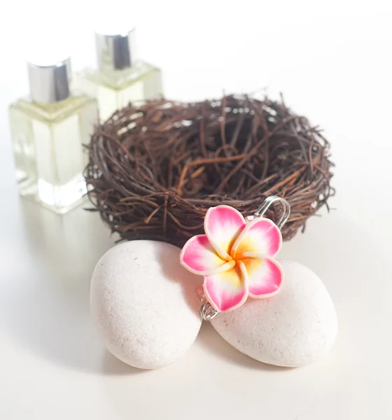Spa concept - Flower brooch on stone — Stock Photo, Image