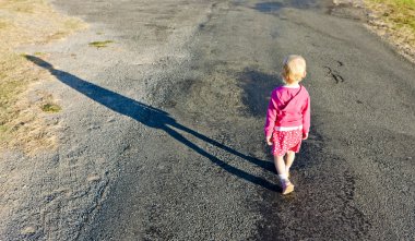 Little girl on walk clipart