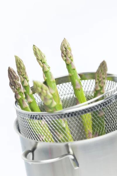 Green asparagus in pot — Stock Photo, Image