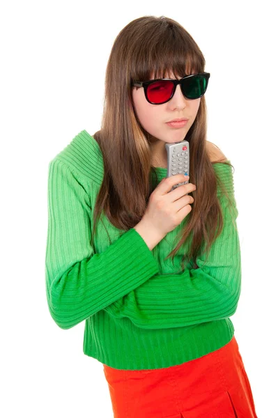 Flicka klädd i 3d-glasögonen håller fjärrkontrollen — Stockfoto