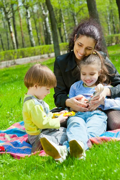 Mother with children resting — Stock Photo, Image