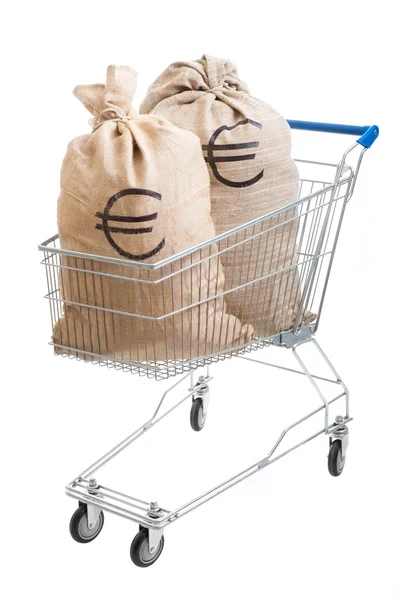 Two sacks full of euro in shopping cart — Stock Photo, Image