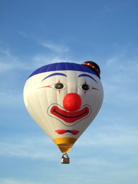 Clown face hot air balloons holiday concept clipart