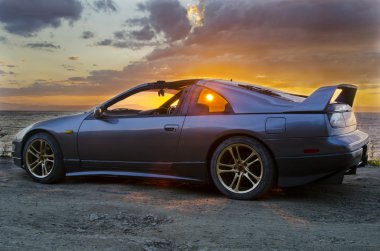 Nissan 300zx at sunset clipart