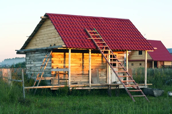 Bouw van de houten huis — Stockfoto