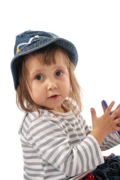 Baby in jeans hoed — Stockfoto