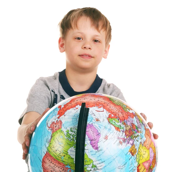 Stock image Little boy with the globe