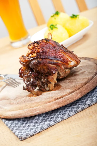 stock image Detail of a bavarian roasted pork dish