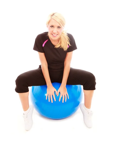 SAt on a Ball — Stock Photo, Image