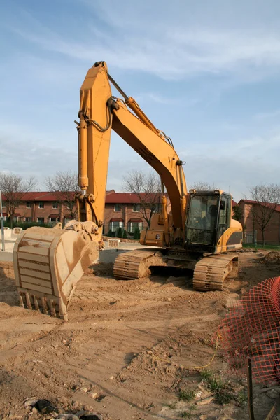 Grävlastare på en byggarbetsplats — Stockfoto