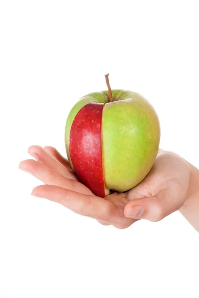 stock image Combination of green apple and red slice