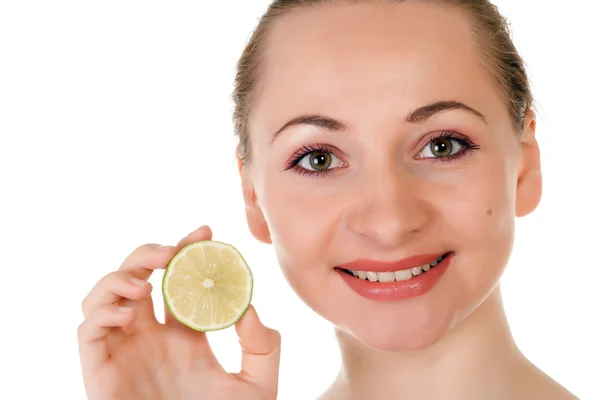 Happy pretty model posing with half of lime — Stock Photo, Image