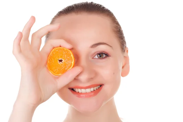 Happy pretty model posing with slice of juicy orange — Stock Photo, Image