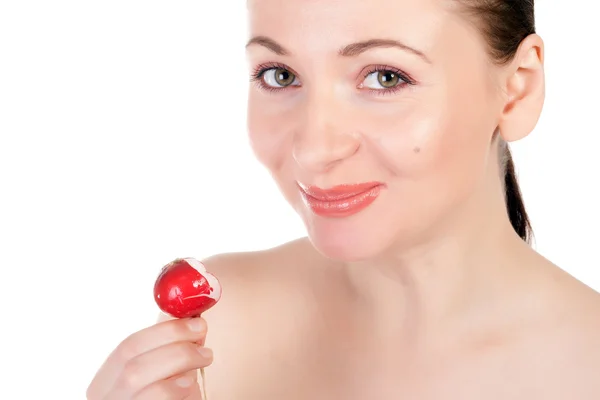 Pretty model holding radishes close to lips — Stock Photo, Image