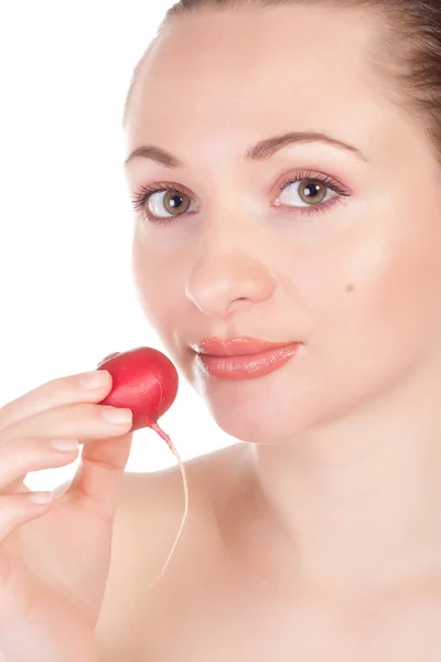 Pretty model holding radishes close to lips — Stock Photo, Image