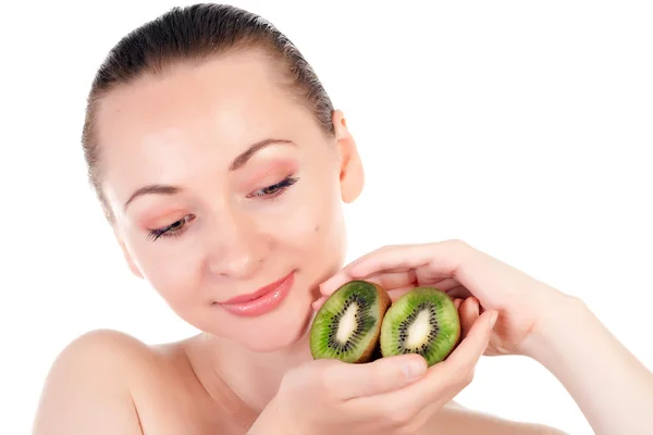 Young woman with slices of kiwi — Stock Photo, Image
