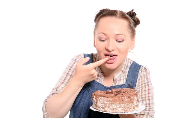 Atrakcyjna kobieta jedzenie tortu — Zdjęcie stockowe