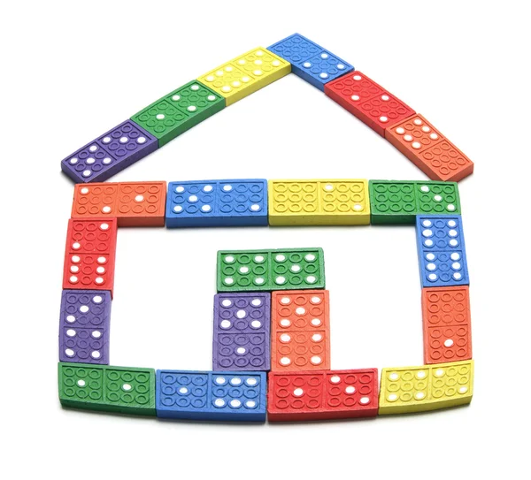 Domino ułożone w domu kształt — Zdjęcie stockowe
