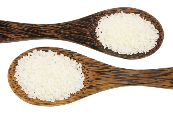 Ρύζι σε ξύλινα κουτάλια — Φωτογραφία Αρχείου