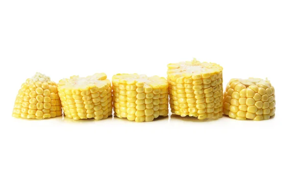 Rij van knip maïs maïskolf stukken — Stockfoto