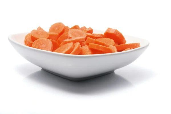 Morötter på tallrik — Stockfoto