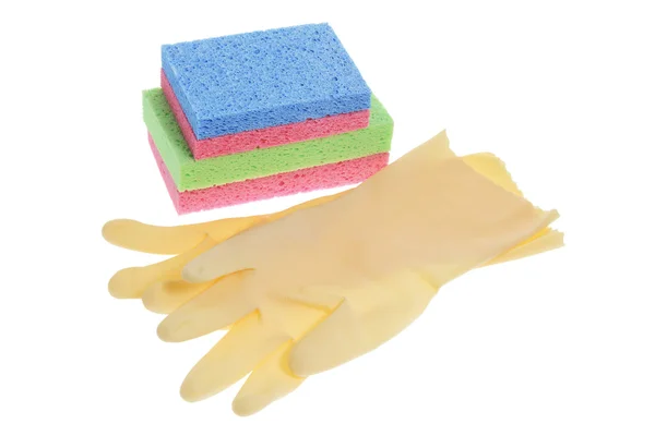 Резиновые перчатки и губки — стоковое фото