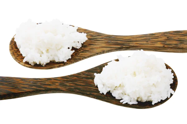 Holzlöffel mit Reis lizenzfreie Stockfotos