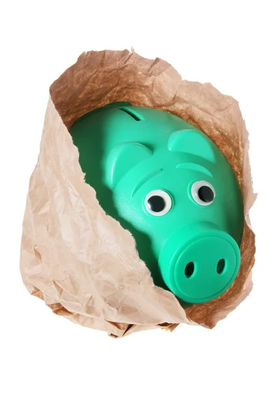 Piggybank в бумажной сумке — стоковое фото