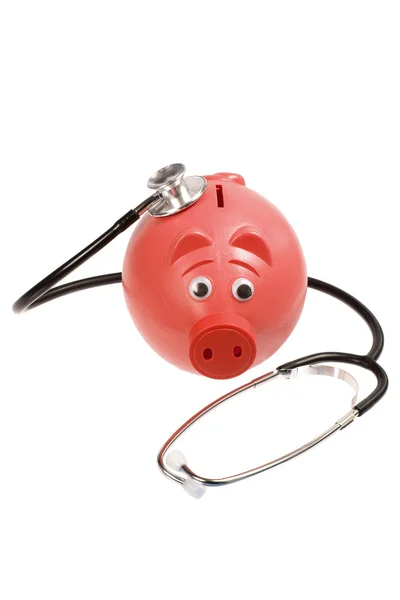 Piggy bank en stethoscoop — Stockfoto