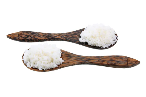 Варёный рис на деревянной ложке — стоковое фото