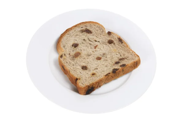 Φέτα ψωμί σταφίδας στο πιάτο — Φωτογραφία Αρχείου