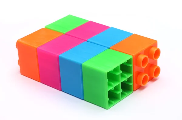 Renkli plastik oyuncak tuğla — Stok fotoğraf