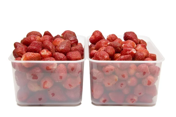 Os morangos maduros em duas caixas _ 1 Imagem De Stock