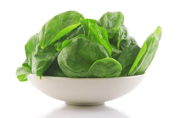 stock image Fresh spinach in a white bowl