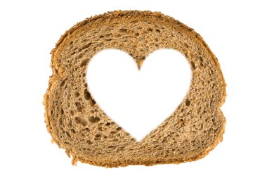 Heart shaped hole in a slice of bread clipart