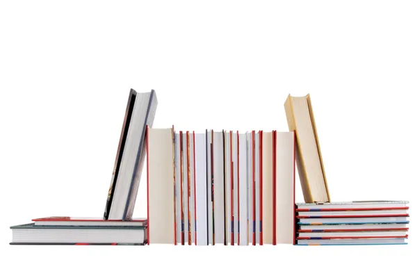 Vista frontal de libros sobre fondo blanco — Foto de Stock