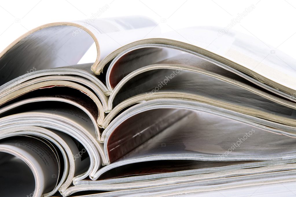 Pile of magazines with bending pages