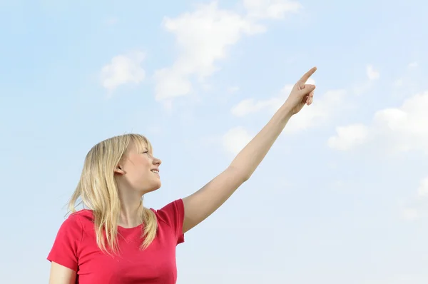 Woman points the sky — Stock Photo, Image