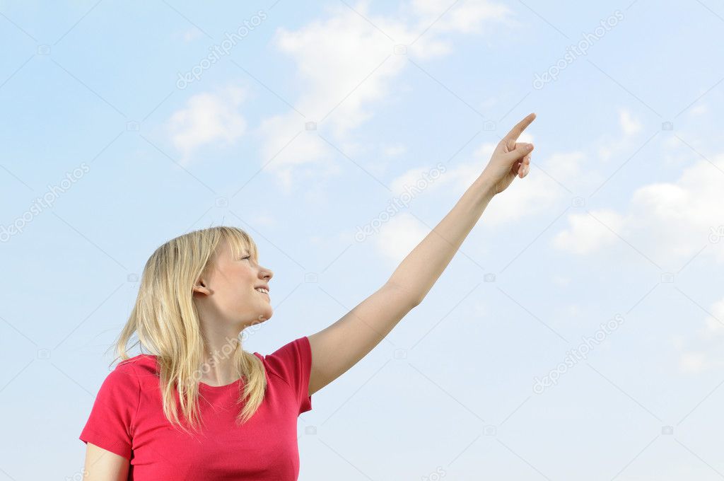 Woman points the sky