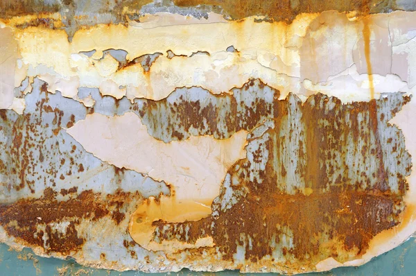 Paslı metal bir plaka üzerinde peeling boya — Stok fotoğraf