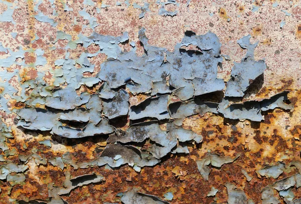 Пілінгова фарба на іржавій металевій пластині — стокове фото