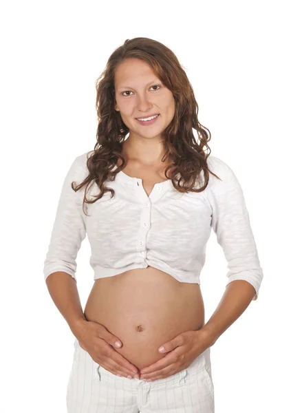 Беременная молодая женщина — стоковое фото