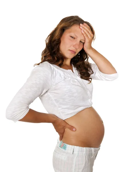 Беременная женщина страдает от боли — стоковое фото
